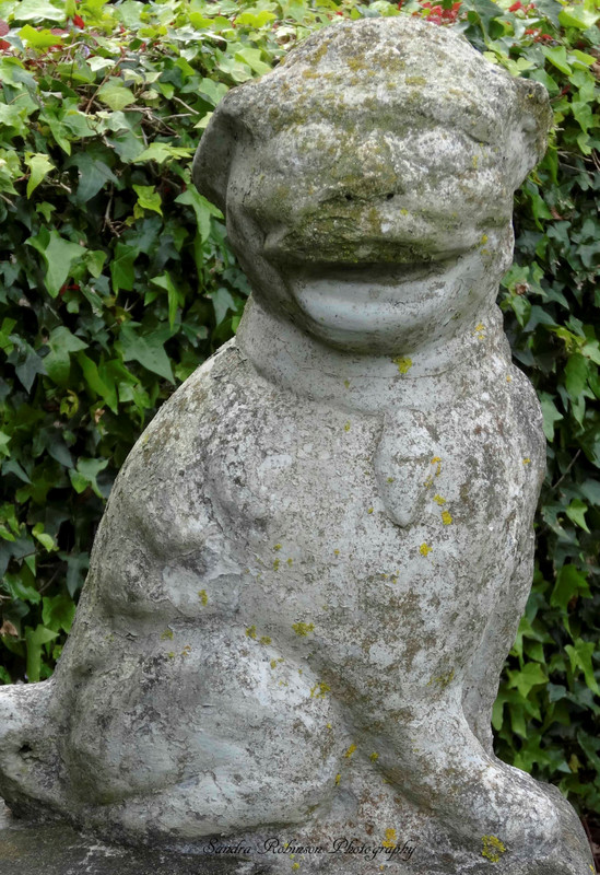 Statue at entrance to the locked garden