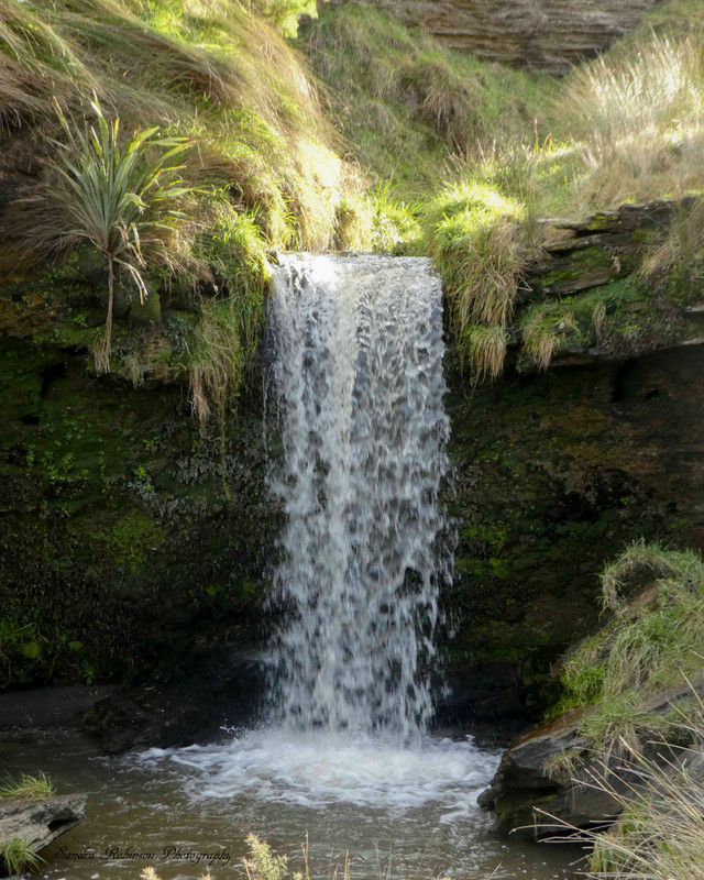 The waterfall on the way down to the beach