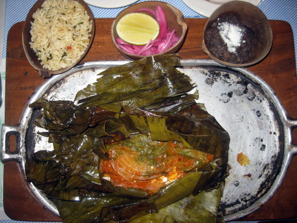 Pollo Pibil, a tasty chicken served in banana leaves, a popular Yucatan dish
