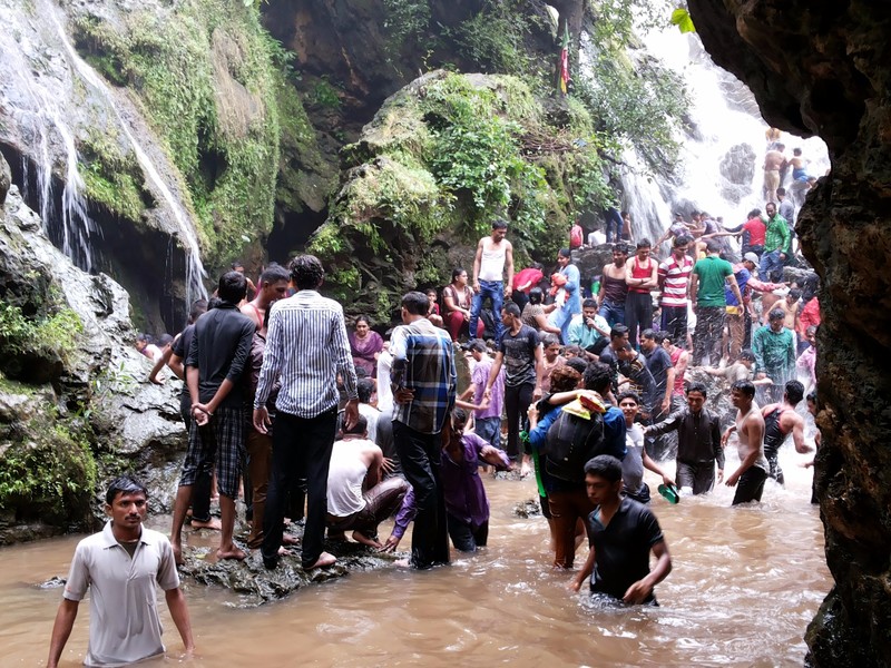 folks enjoying the waterfall