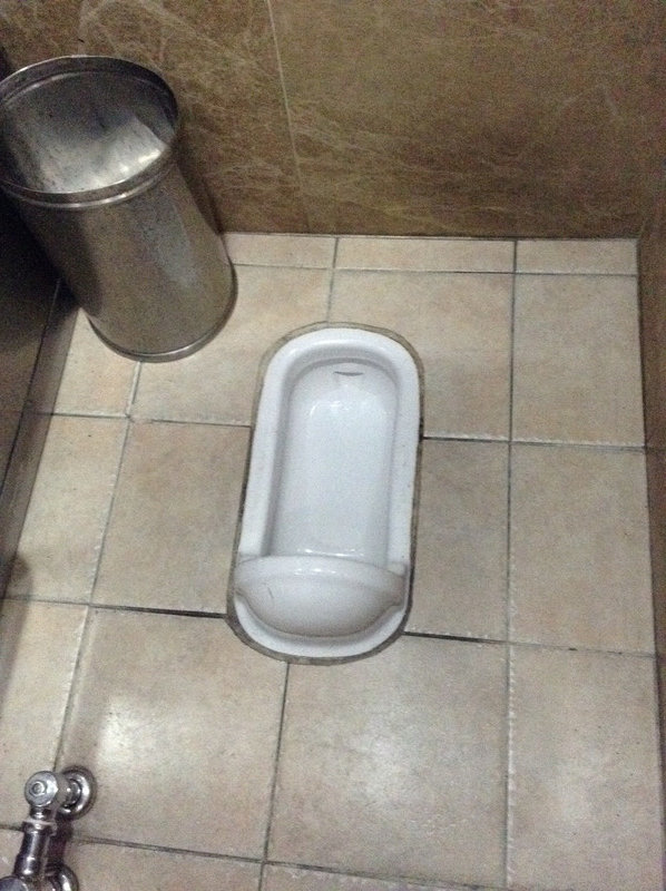 Squatting toilet.