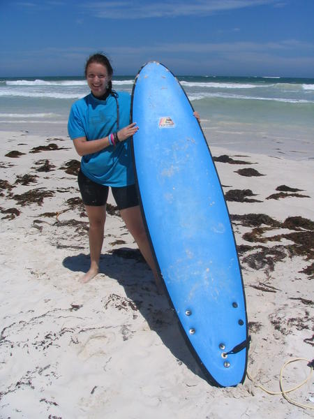 Dafne with a surfboard