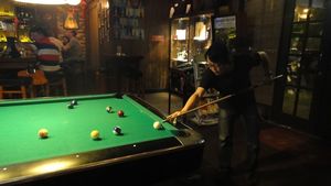 Mr. Yu is actually good at pool
