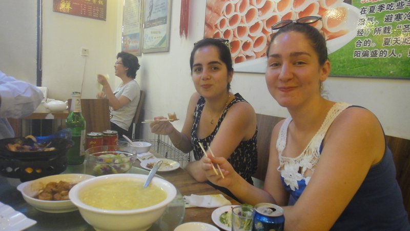 Fernanda and Liz pose with food
