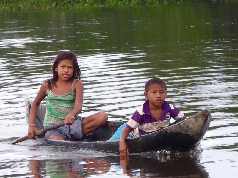 These kids paddled out to our boat in the hope of selling me some souvenirs 