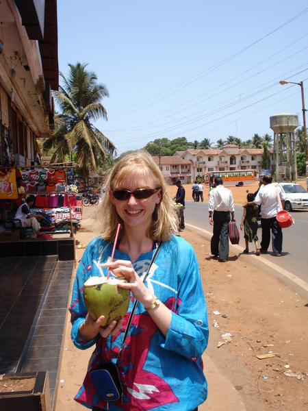 Kat coolin with a coconut