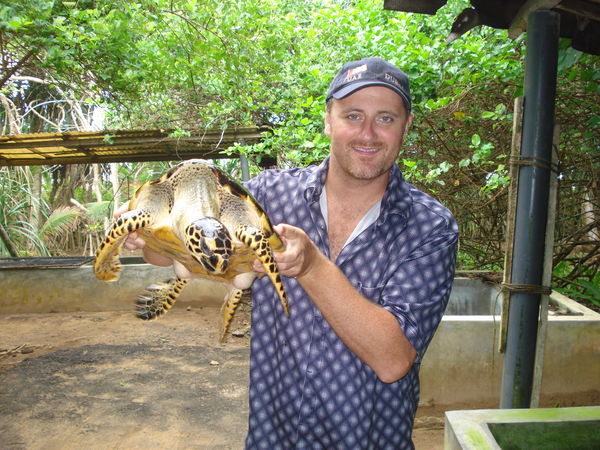 Happy Sonny with a Turtle.
