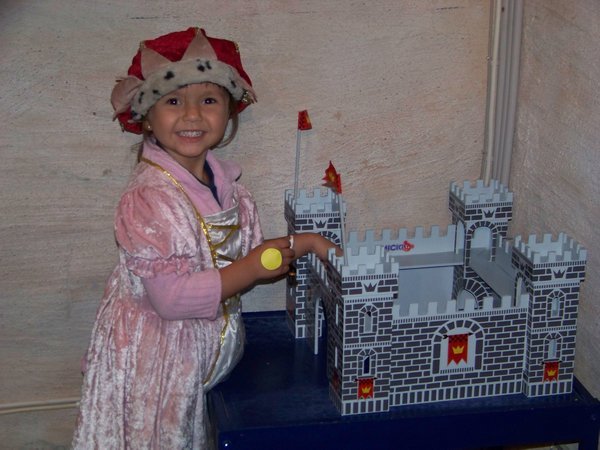 Queen Sofia playing with her castle
