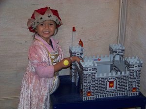 Queen Sofia playing with her castle