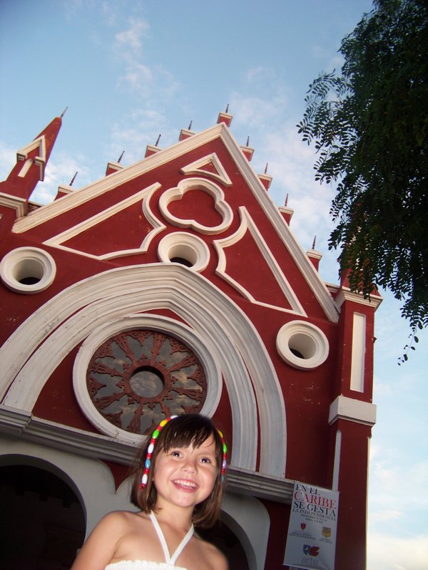 Smiling in Front of an Iglesia