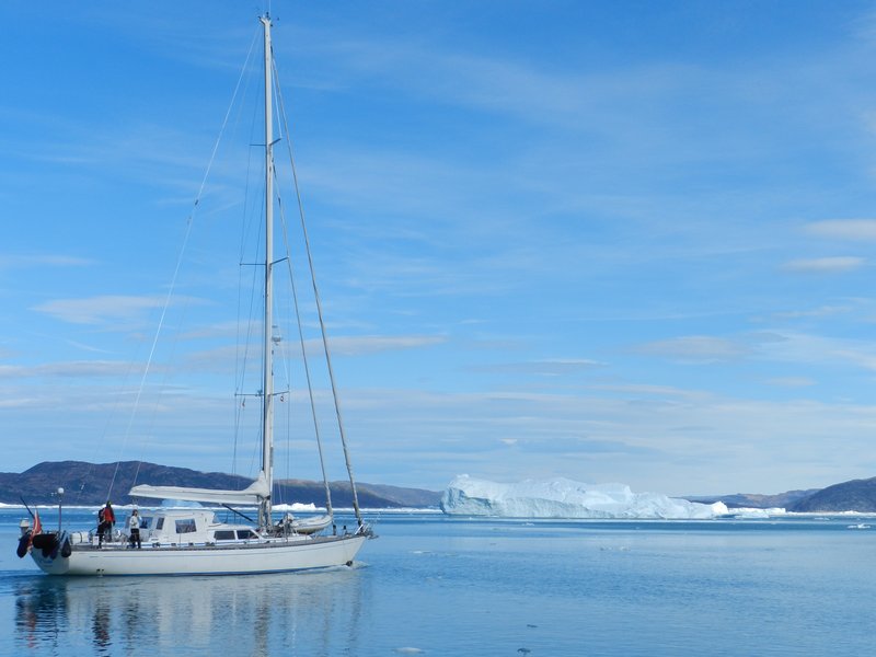 Boat and Giant Iceberg
