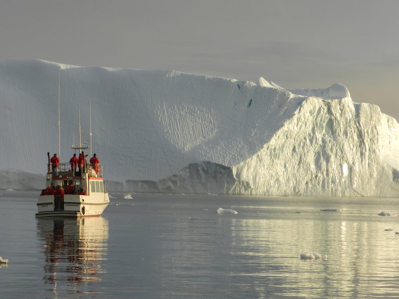 Boat and Giant Iceberg
