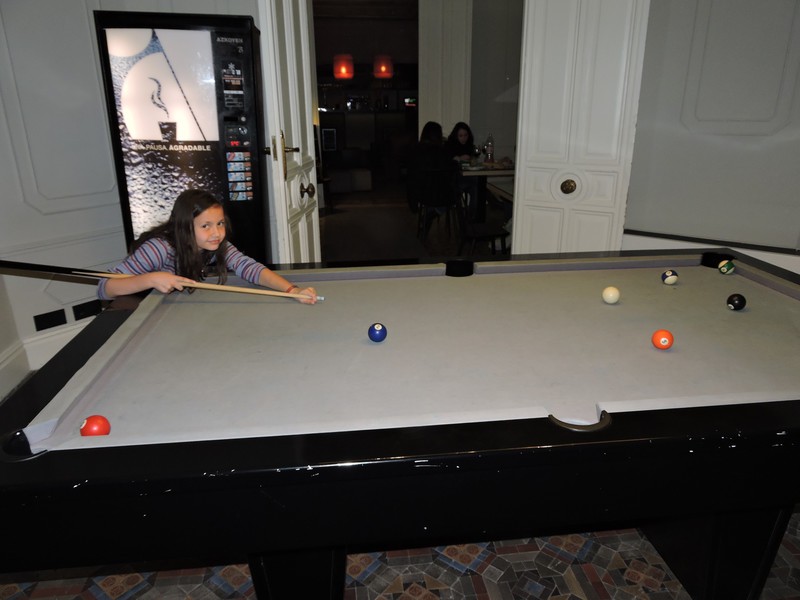 Playing pool at the hostel