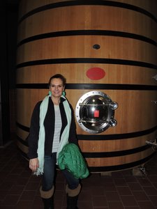 Ania and big barrel of wine