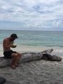 Drinking coconut water from a coconut. Looks good - tastes horrible