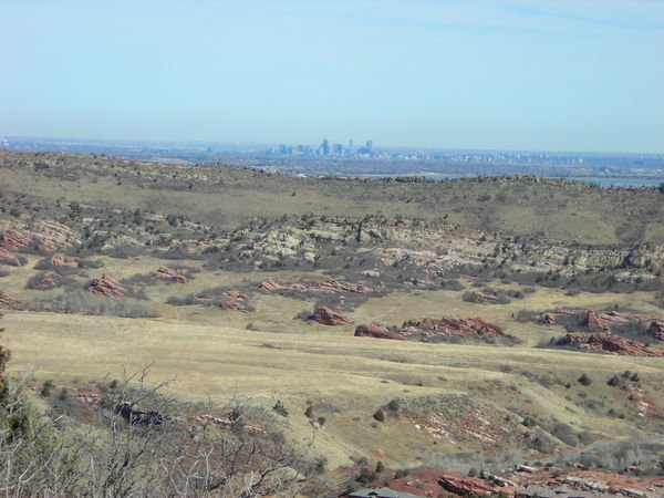 Downtown Denver visible beyond the hogbacks