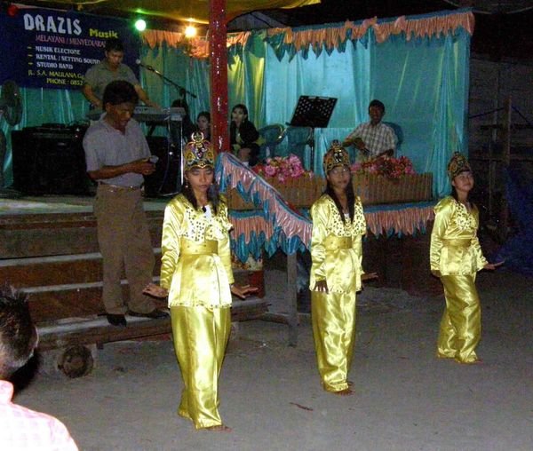 Local girls performing at the wedding