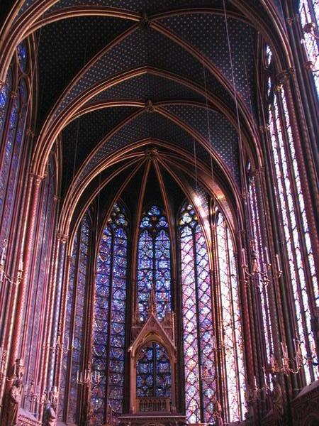 Sun streams through the stained glass windows of St Chappelle