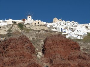 the village of oia looks like its falling over the cliff