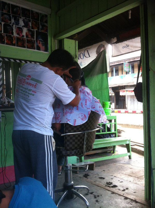 Phil getting a haircut for 1000 kyat