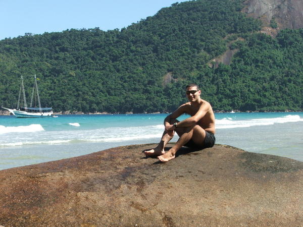 Merman on rock - Dois Rios