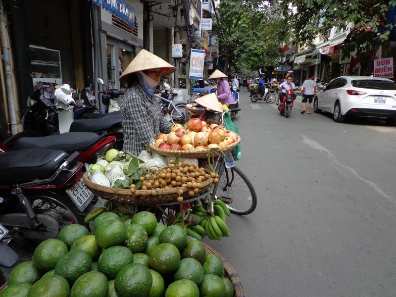 Fresh Fruit Bicycle Vendors (the old way) in the old Quarter Hanoi