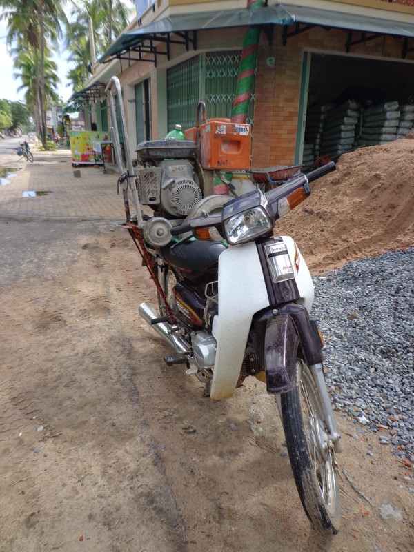 Heavy Construction Compactor strapped to Scooter Seat, Moi Ne S Viet Coast