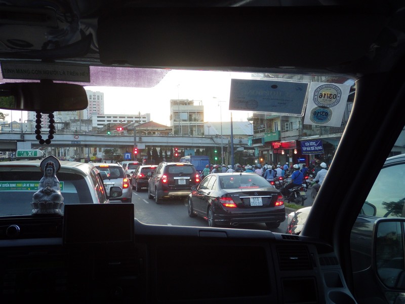 Buddha Telling passengers Stuck in Siagone Rush Hour Seperate Scooter Lane Right