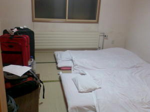 Our hotel room with tatami mat beds on the floor