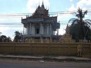 Back onto a road, temple passing
