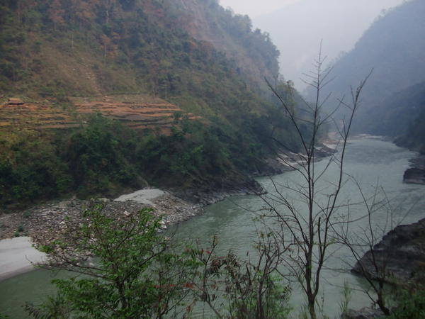 Nepal river with terraced fields
