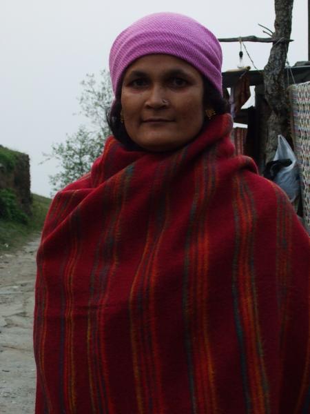 Nepali girl with blanket she made