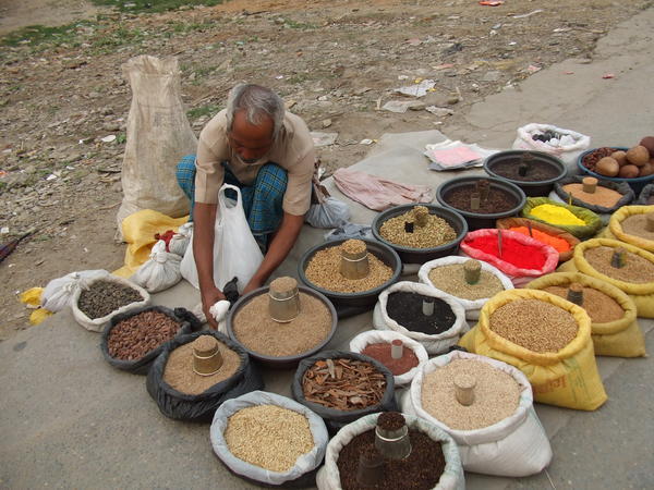 Man selling spices 
