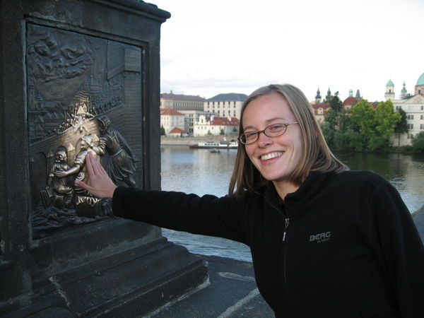 Rubbing the bridge to make our wish come true or ensure our return to Prague someday or something like that