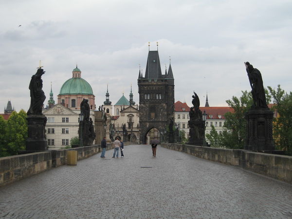 Walking on Charles Bridge early in the morning