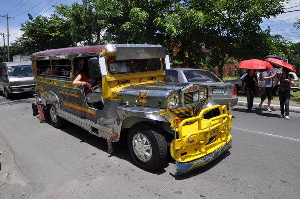 Jeepney's - minibuses all over Manila, a modified truck originating from WWII