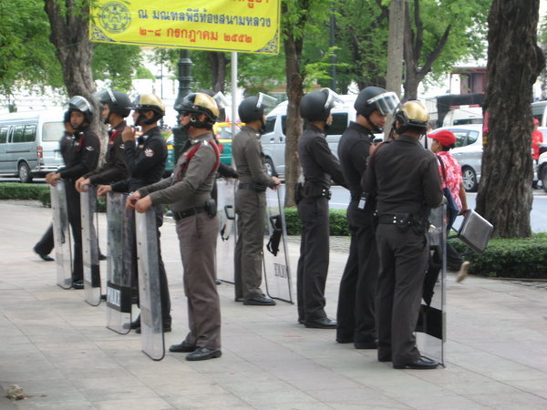 Police watching over a political demonstration near the palace, Thailand's been going through some political controversy recently