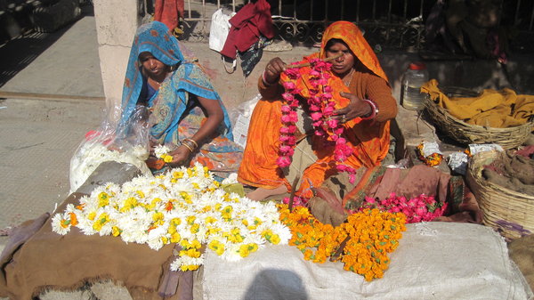 Beautiful colours of the sari's and flowers