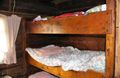 Four high bunk beds where all seven Kilcher Kids slept