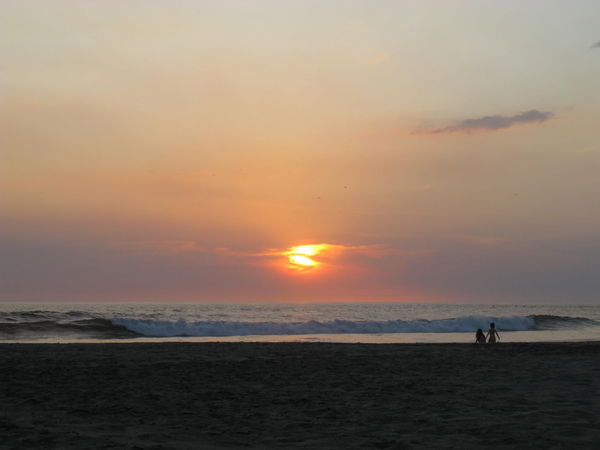 Walking the beach at sunset