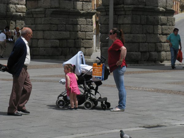 Child stroller with "hitch hiker"