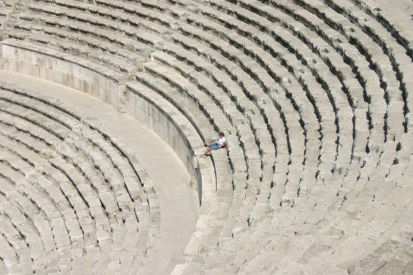 Chelle seated in the ampitheatre