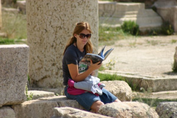 Chelle reading the guidebook