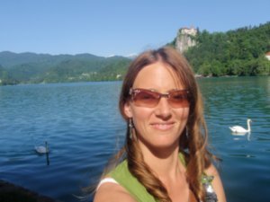 Me in front of Lake Bled with Bled Castle in the background