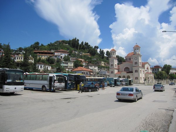 The bus station with the church in the background
