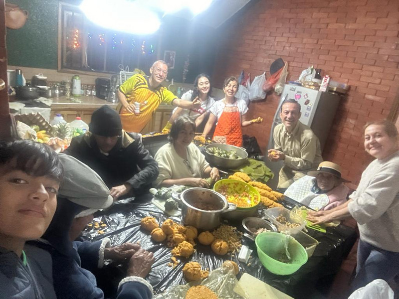 Making the "tamales" as a family. A time–honoured Colombian culinary Christmas tradition.