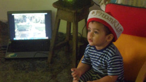 My lovely nephew watching a Christmas Carol video