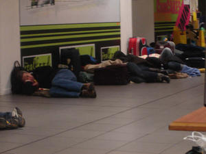 Everyone Else Sleeping in the Airport