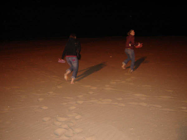 Paige and I running in the sand