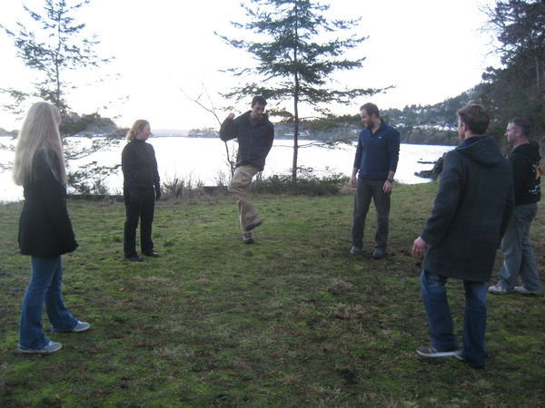 A bit of hacky sack down by the water 
